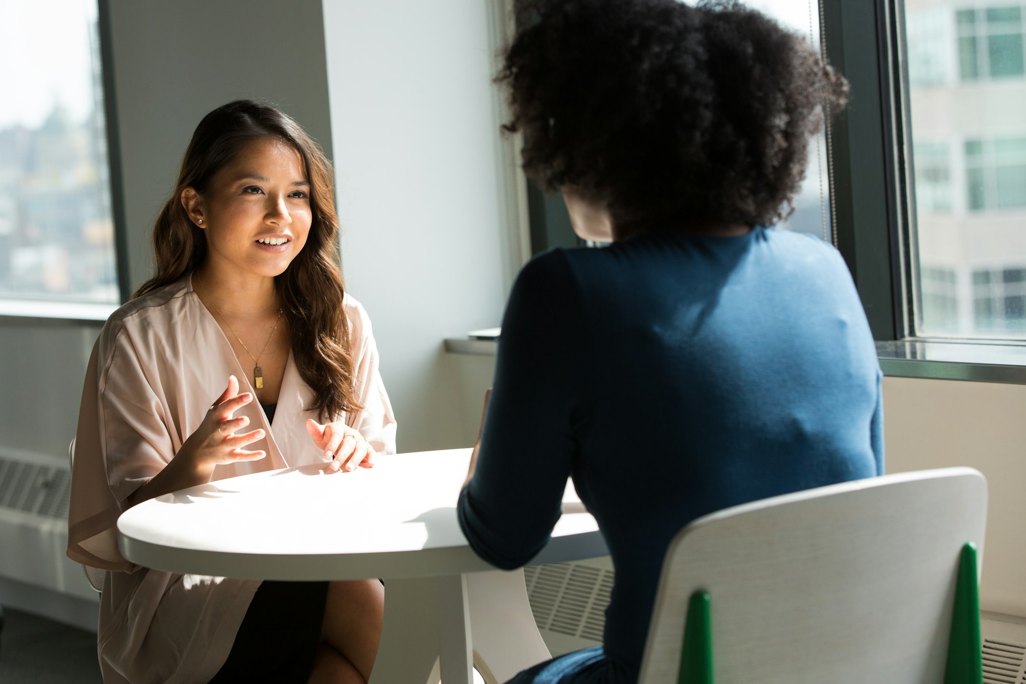 Professional in a focused leadership conversation
