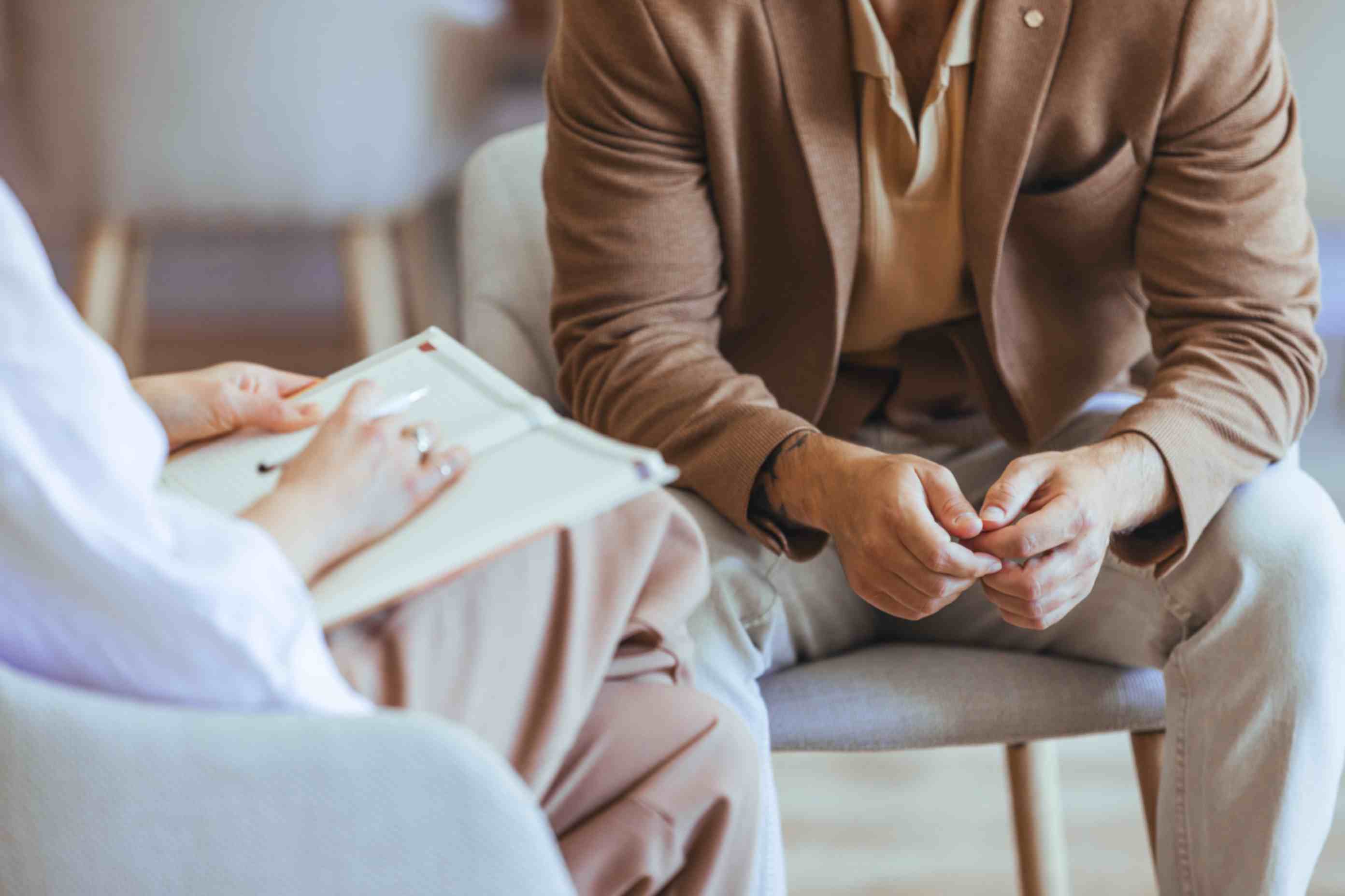 Therapist with a client during an individual therapy consultation.