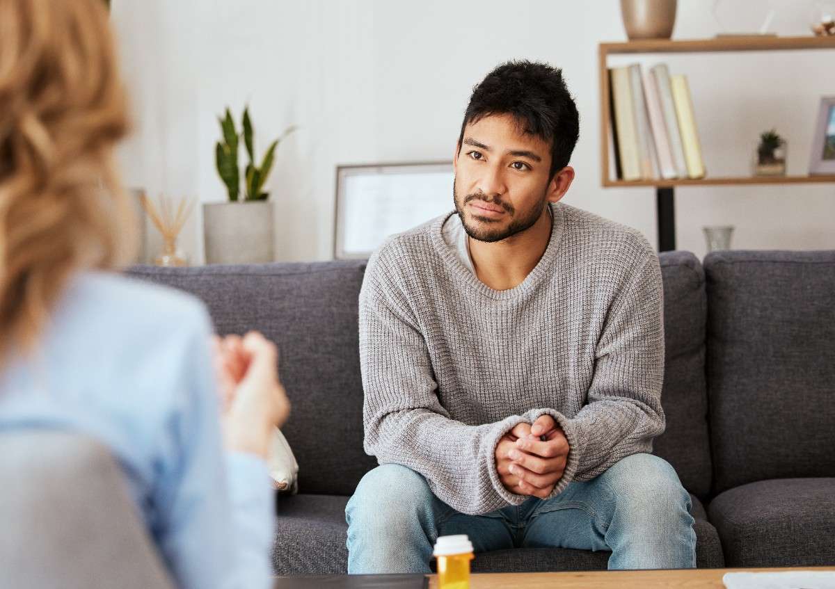 Therapist listening attentively during an individual therapy session
